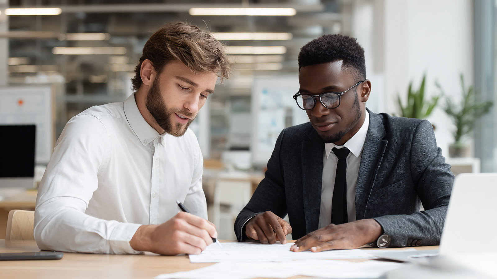 u3738837184_Real_HD_photo_of_two_businessmen_one_white_and_on_6c9f3100-5bcb-4449-af98-fb6deb19b610_1